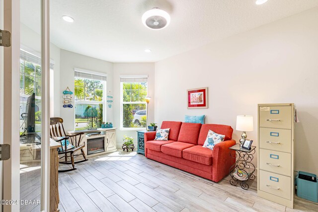 1078 Castaway Ct, Daytona Beach, FL 32124 - living area featuring light wood finished floors and recessed lighting