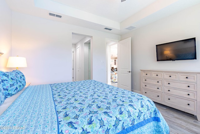 bedroom with light wood-type flooring