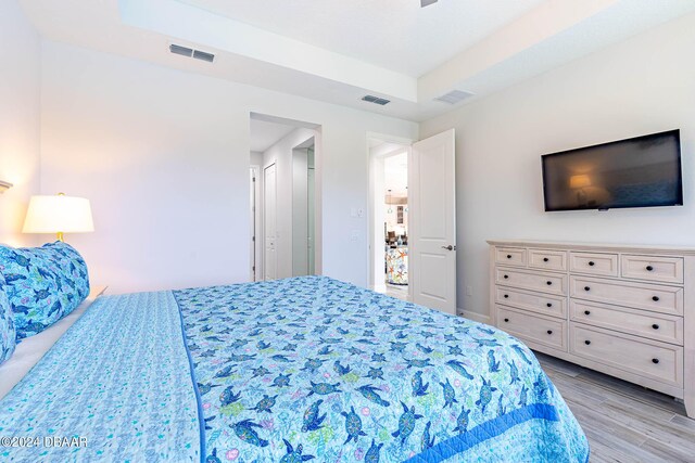 1078 Castaway Ct, Daytona Beach, FL 32124 - bedroom with light wood-style floors and baseboards