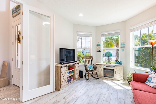 1078 Castaway Ct, Daytona Beach, FL 32124 - living area with light wood finished floors, plenty of natural light, and recessed lighting