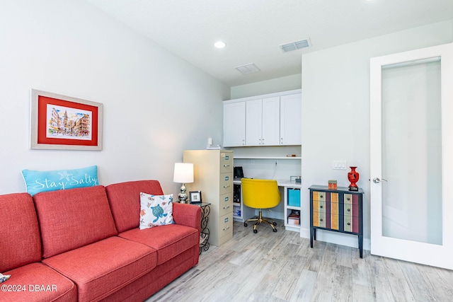 1078 Castaway Ct, Daytona Beach, FL 32124 - living area with light wood-style flooring, a desk, and recessed lighting