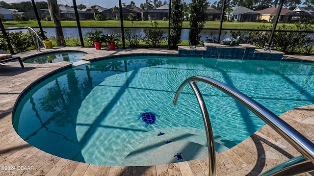 view of swimming pool with a water view, glass enclosure, and an in ground hot tub