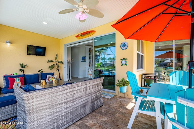 1078 Castaway Ct, Daytona Beach, FL 32124 - view of patio / terrace with outdoor lounge area, outdoor dining space, and ceiling fan