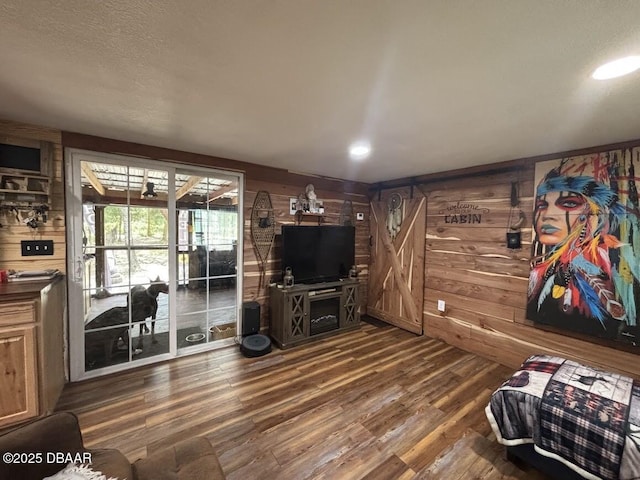 17531 NE 139th Ave, Fort Mccoy, FL 32134 - living area with wooden walls, dark wood-style flooring, and recessed lighting
