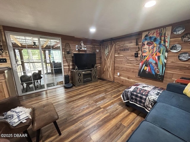 17531 NE 139th Ave, Fort Mccoy, FL 32134 - living room with wood walls, wood finished floors, and recessed lighting