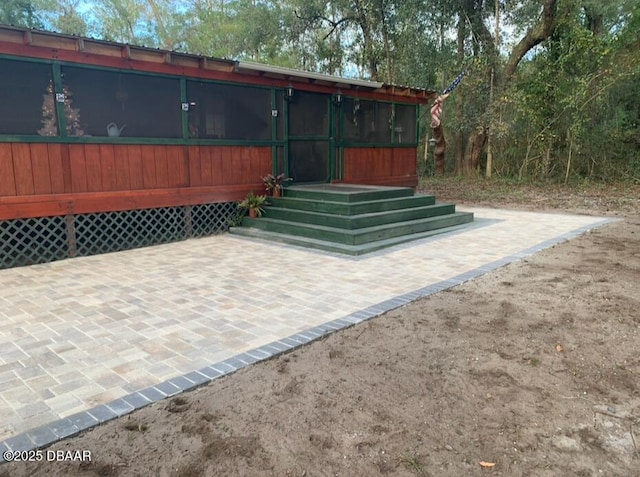 17531 NE 139th Ave, Fort Mccoy, FL 32134 - view of patio featuring a sunroom