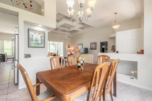 dining area featuring plenty of natural light, baseboards, light tile patterned flooring, and coffered ceiling