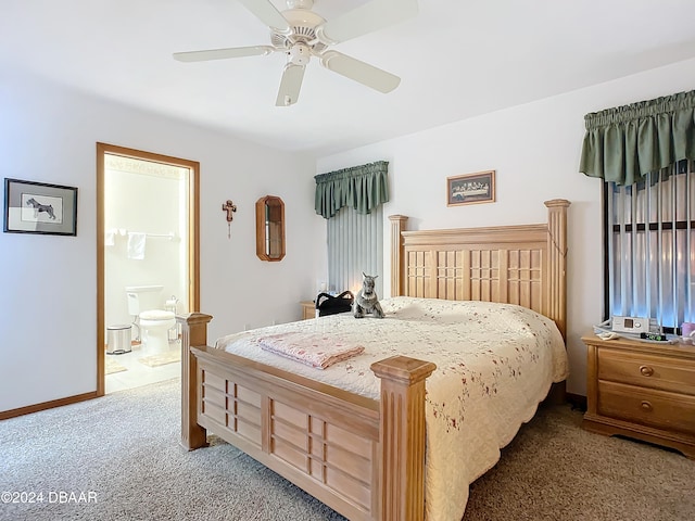 bedroom featuring connected bathroom, ceiling fan, and carpet floors