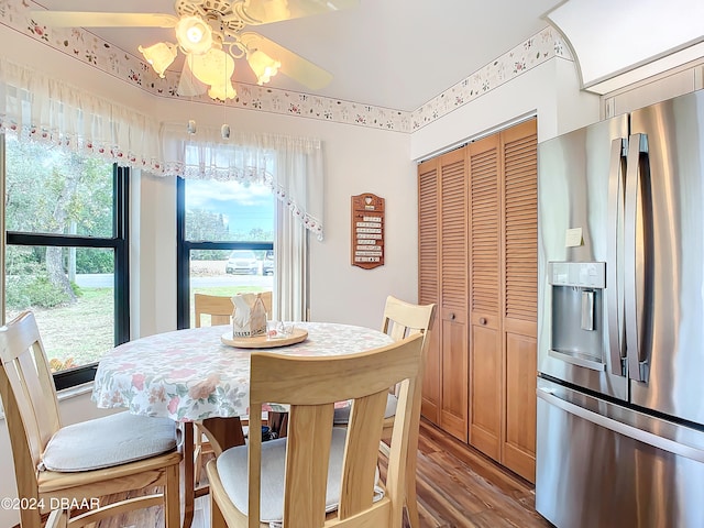 dining space featuring ceiling fan and hardwood / wood-style floors