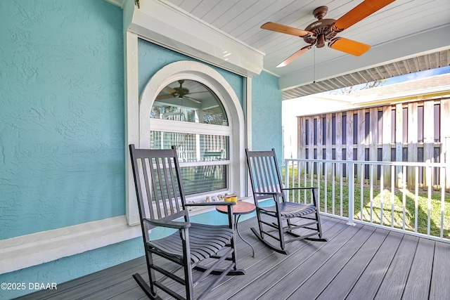 deck featuring ceiling fan and covered porch