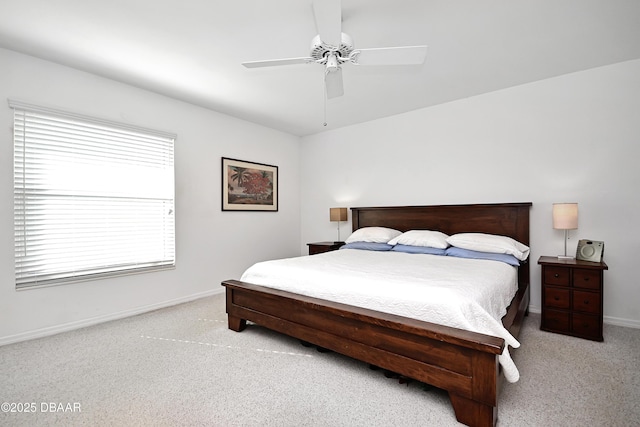 bedroom with light carpet and ceiling fan