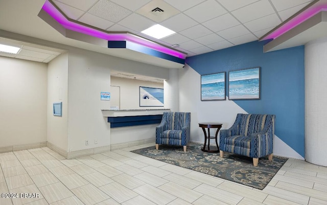 2700 N Atlantic Ave Unit 423, Daytona Beach, FL 32118 - living area featuring a drop ceiling