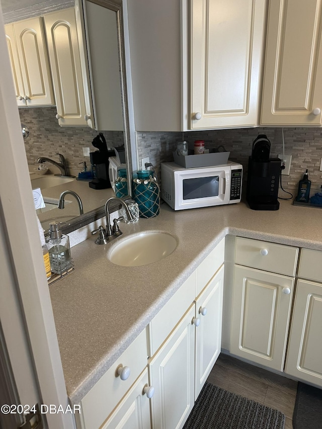 2700 N Atlantic Ave Unit 423, Daytona Beach, FL 32118 - bathroom with decorative backsplash and vanity