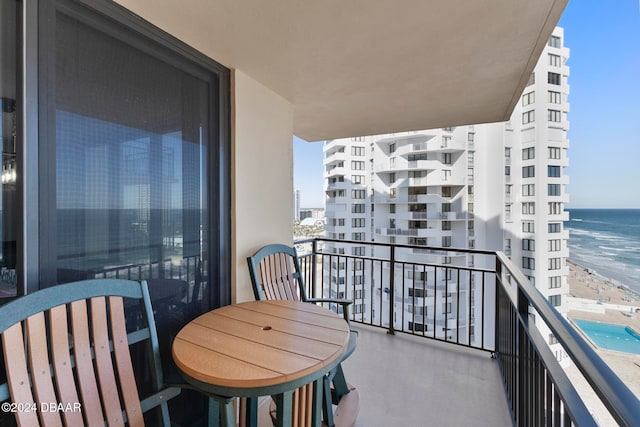 balcony featuring a water view