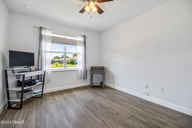 interior space with hardwood / wood-style floors and ceiling fan