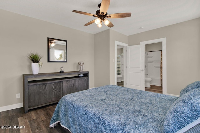 bedroom featuring connected bathroom, ceiling fan, and dark wood-type flooring