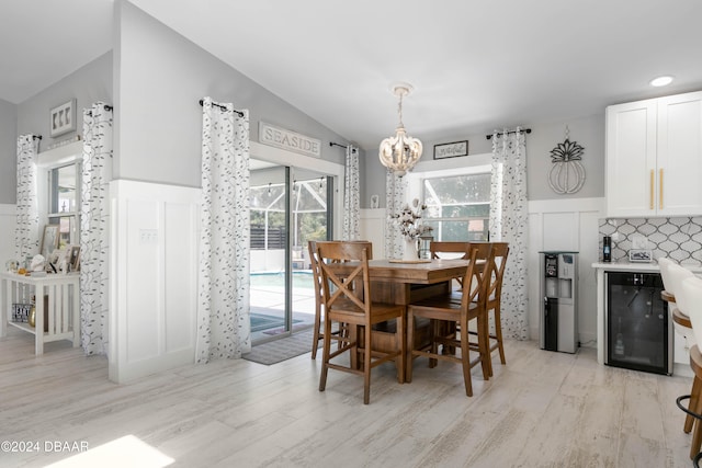 dining room with light hardwood / wood-style flooring and plenty of natural light