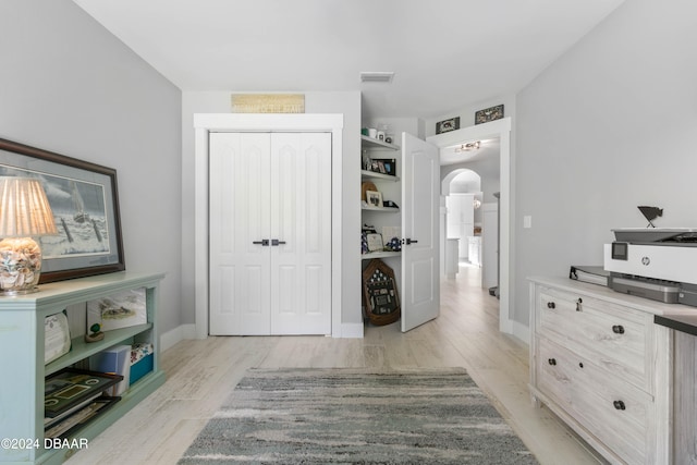 hall featuring light hardwood / wood-style floors