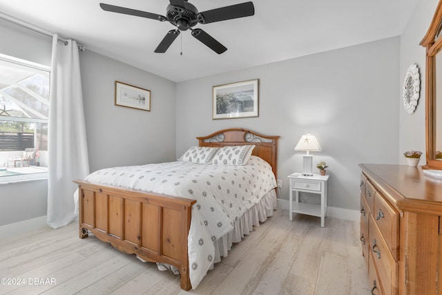 bedroom featuring ceiling fan and light hardwood / wood-style flooring