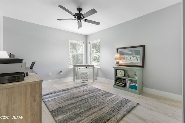 office area with ceiling fan and hardwood / wood-style flooring