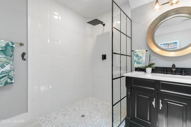 bathroom featuring vanity and a tile shower