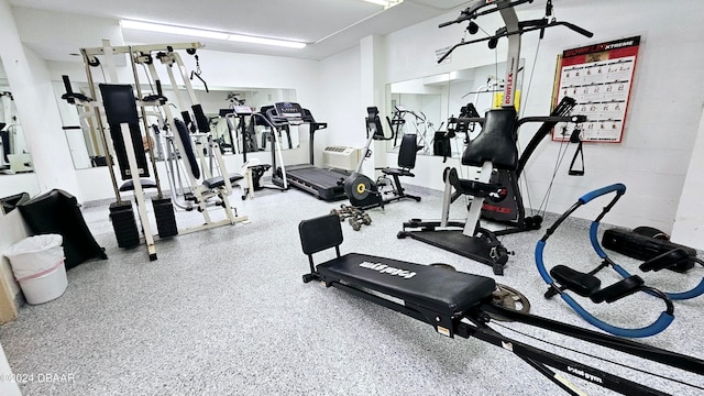 workout area with an AC wall unit