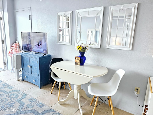 view of tiled dining space