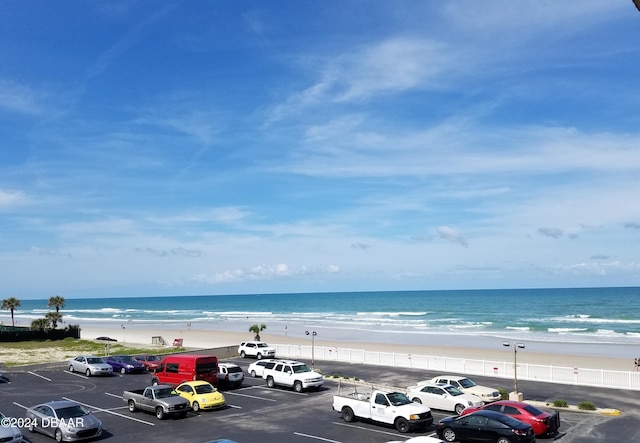 property view of water featuring a beach view