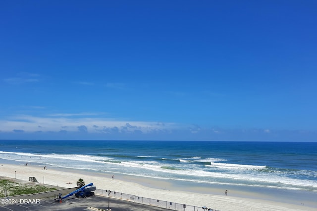 property view of water featuring a beach view