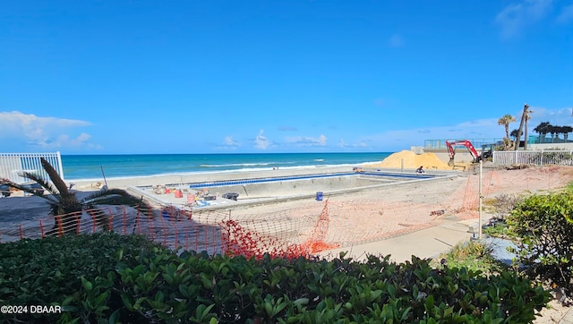 view of water feature with a beach view