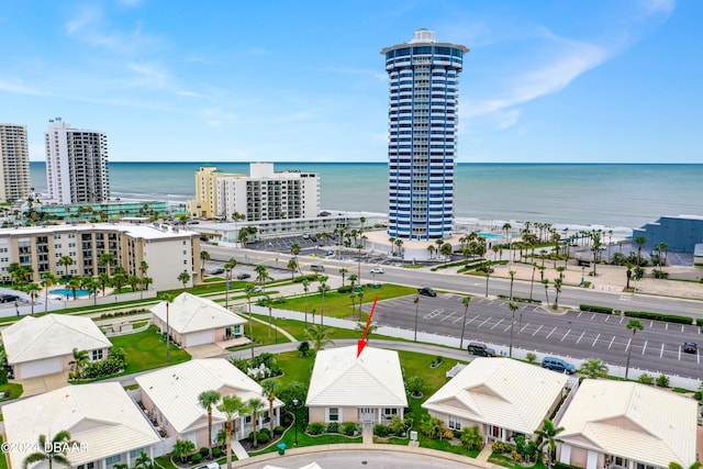 drone / aerial view with a water view