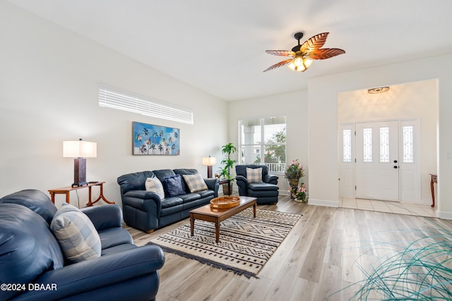 living room featuring ceiling fan and light wood-type flooring