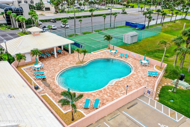 view of pool featuring a patio