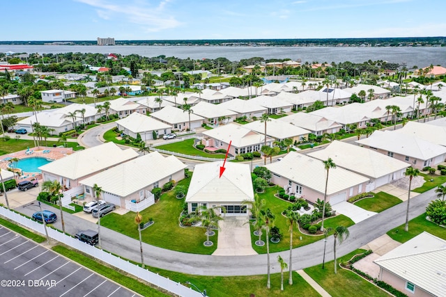 drone / aerial view featuring a water view