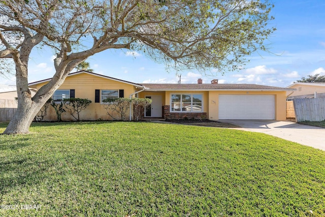 ranch-style home with a garage and a front yard