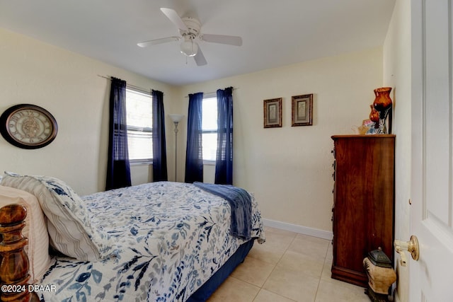 37 Poinsettia Dr, Ormond Beach, FL 32176 - bedroom featuring baseboards, light tile patterned floors, and a ceiling fan