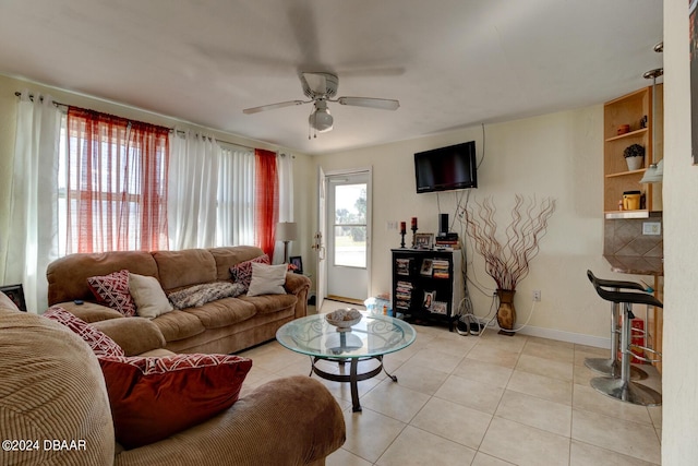 37 Poinsettia Dr, Ormond Beach, FL 32176 - living area featuring ceiling fan, light tile patterned flooring, and baseboards