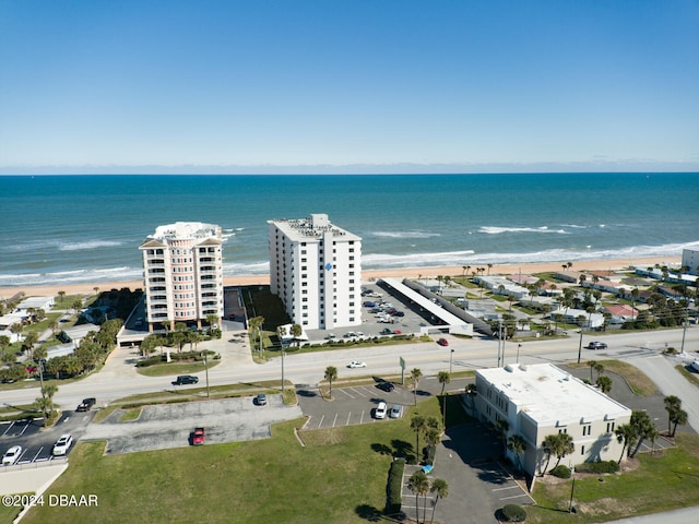 bird's eye view with a beach view and a water view