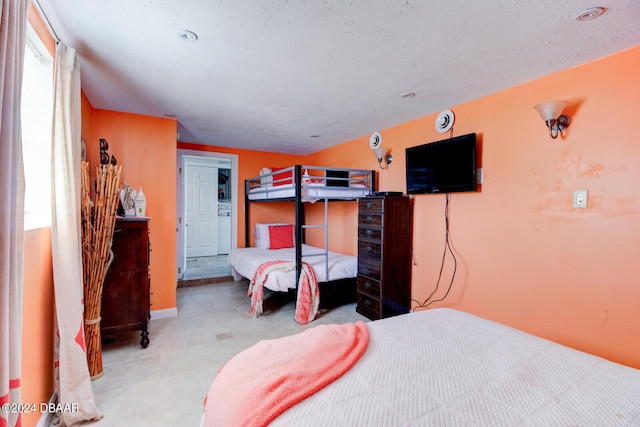 bedroom featuring a textured ceiling