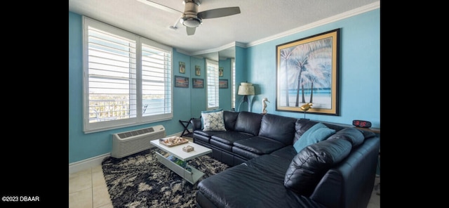 tiled living room featuring ceiling fan, ornamental molding, a textured ceiling, and a wall mounted air conditioner