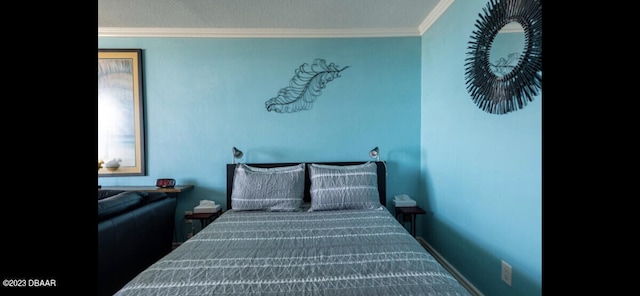 bedroom with ornamental molding