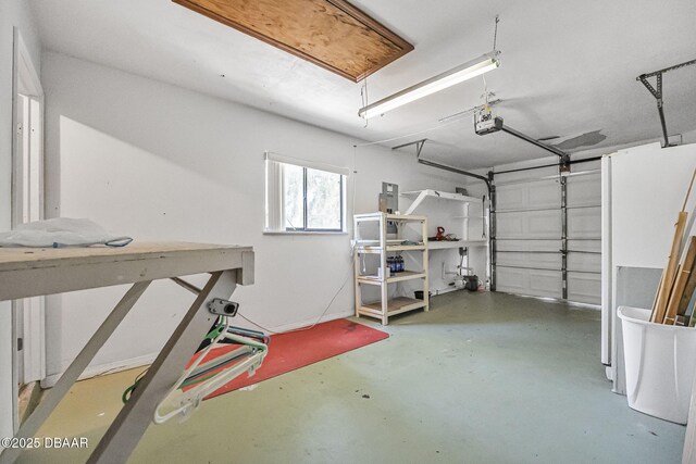 2249 Swoope Dr, New Smyrna Beach, FL 32168 - garage featuring a garage door opener