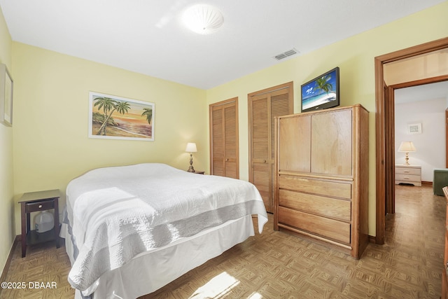2249 Swoope Dr, New Smyrna Beach, FL 32168 - bedroom featuring visible vents and multiple closets