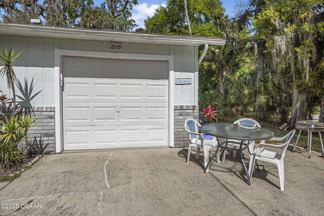 2249 Swoope Dr, New Smyrna Beach, FL 32168 - garage with driveway