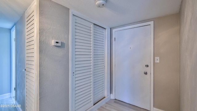 2800 N Atlantic Ave Unit 611, Daytona Beach, FL 32118 - doorway to outside with light wood-style flooring