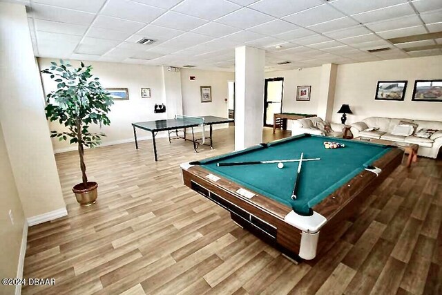 playroom with a drop ceiling, wood-type flooring, and billiards