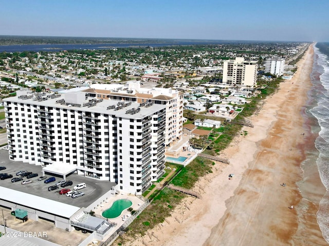 aerial view featuring a beach view and a water view