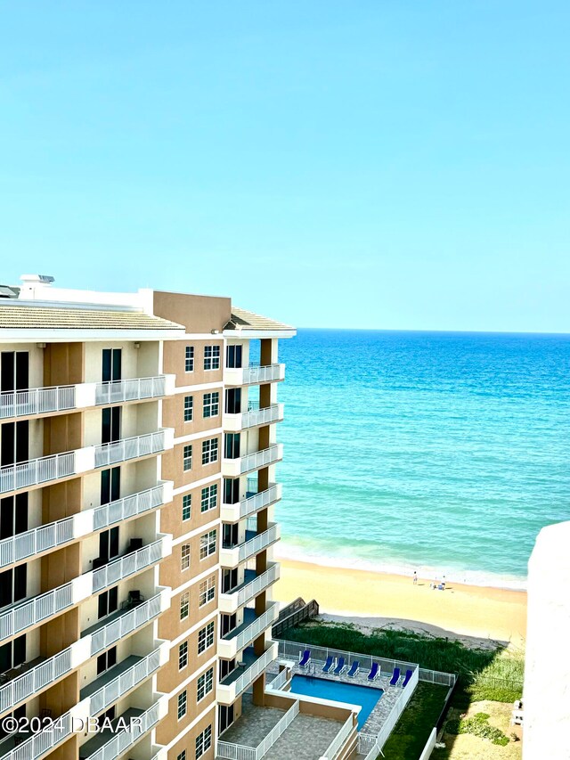 view of water feature with a beach view