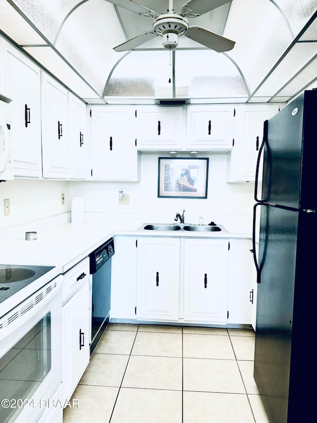 kitchen featuring white cabinetry, black appliances, light tile patterned floors, and sink