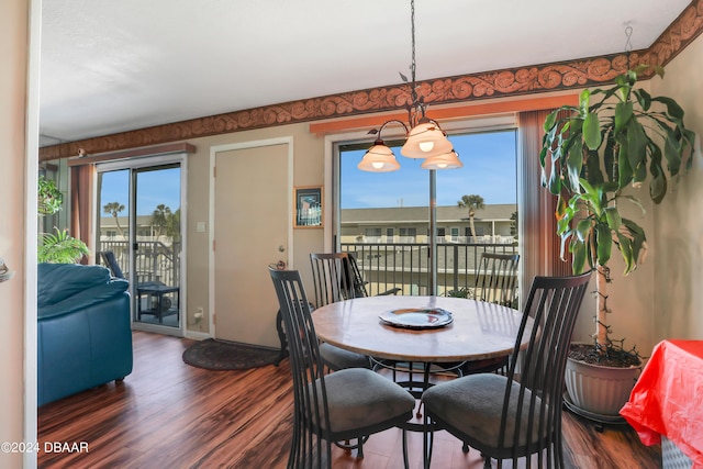 335 N Causeway Cswy Unit E220, New Smyrna Beach, FL 32169 - dining area featuring dark wood finished floors